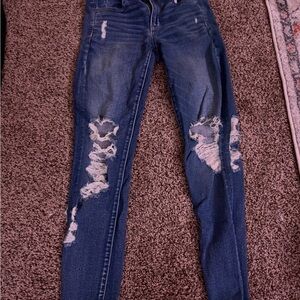 Distressed Blue Jeans